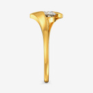 Side profile of gold bypass ring showing raised solitaire diamond and tapered band