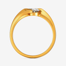 Top view of round gold solitaire ring with swirl shank and centered diamond
