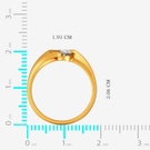 Gold solitaire diamond ring shown against a centimeter scale to indicate size and width
